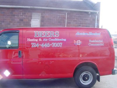 Rear Oblique of Lettered Van